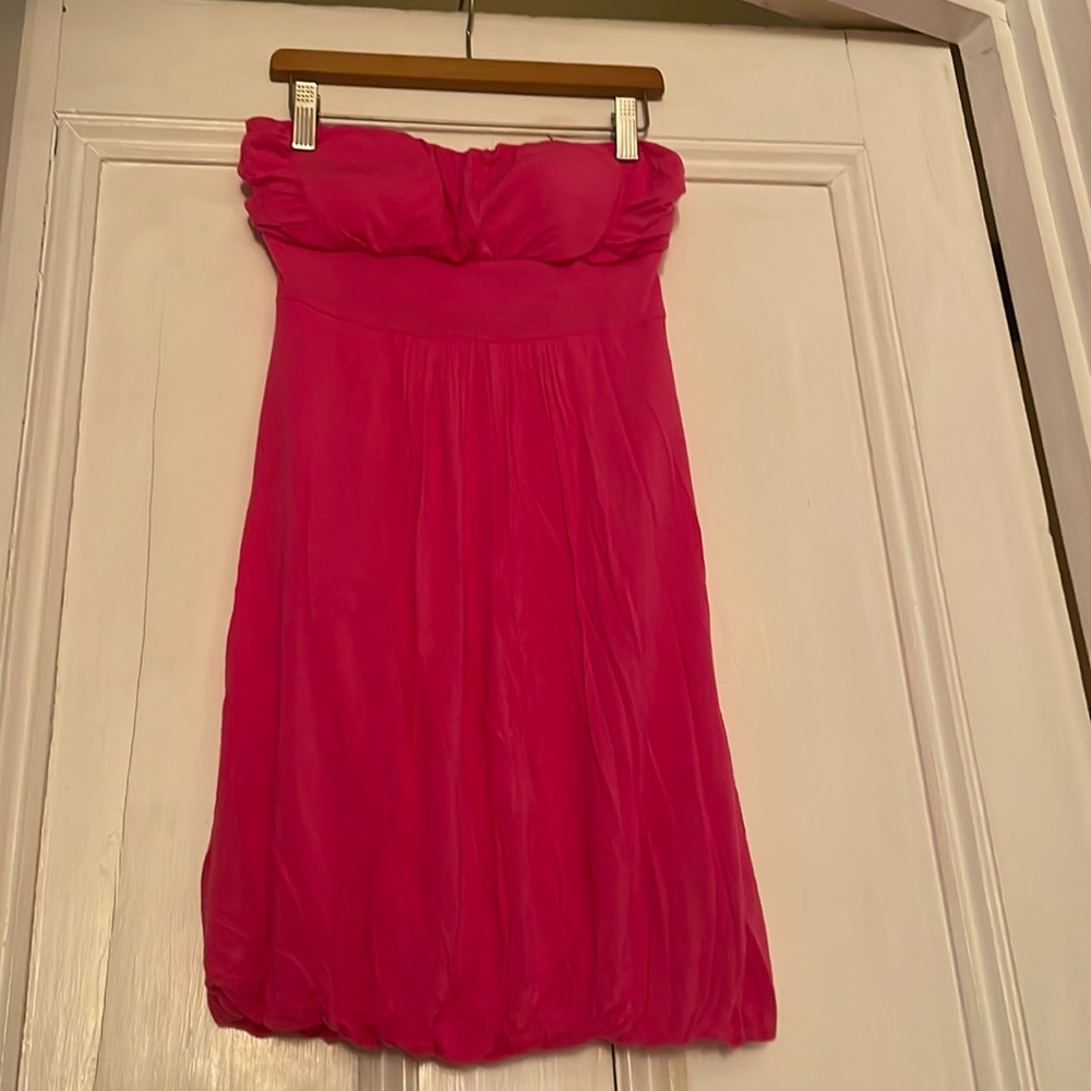 Pink strapless dress has chest cups inside